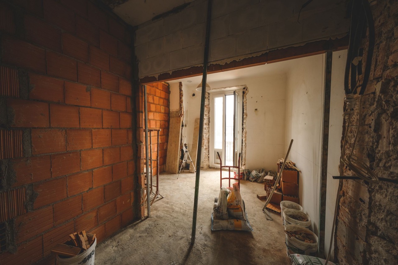 Property mid-refurbishment with exposed brick walls